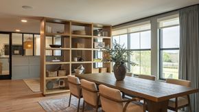 Austin apartment for rent - A dining room with a wooden table and chairs.